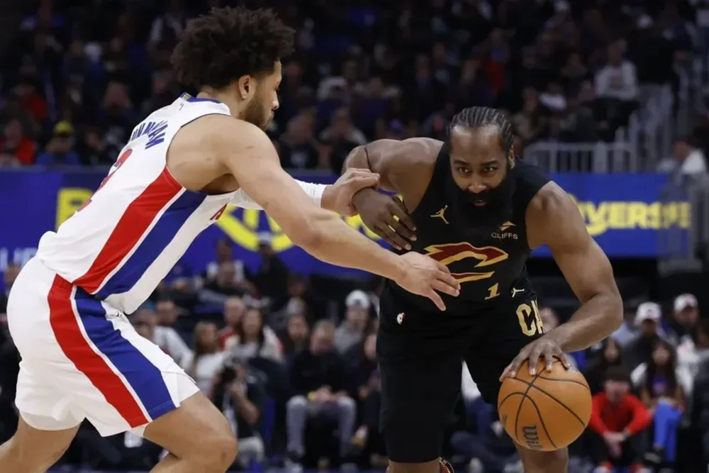 May 5, 2026; Detroit, Michigan, USA; Cleveland Cavaliers guard James Harden (1) dribbles defended by Detroit Pistons guard Cade Cunningham (2) in the first half during game one of the second round of the 2026 NBA Playoffs at Little Caesars Arena. Mandatory Credit: Rick Osentoski-Imagn Images